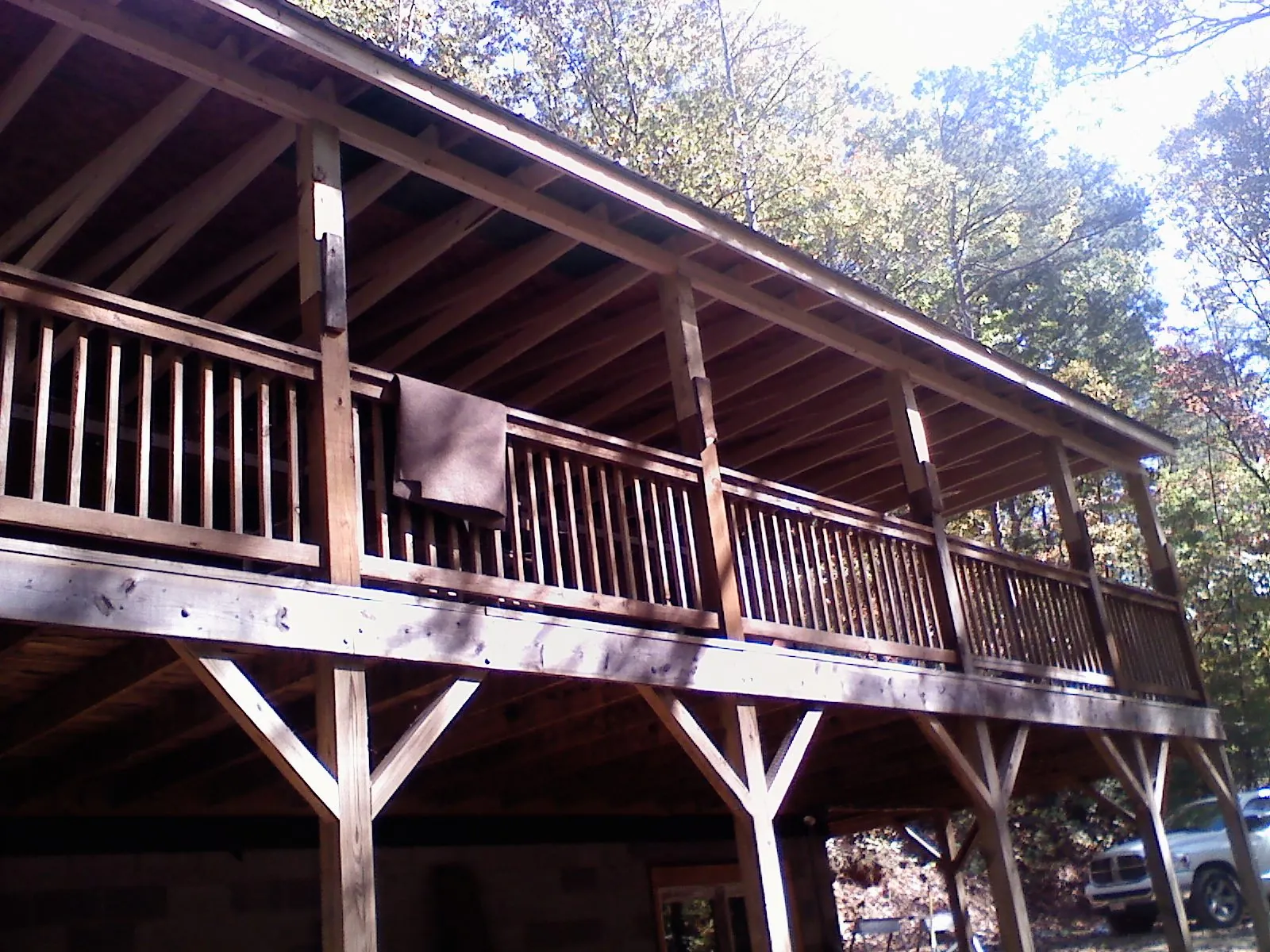 Timber framing under a new elevated porch and deck — Roof Leak Repair in Washington by Roofing Brothers